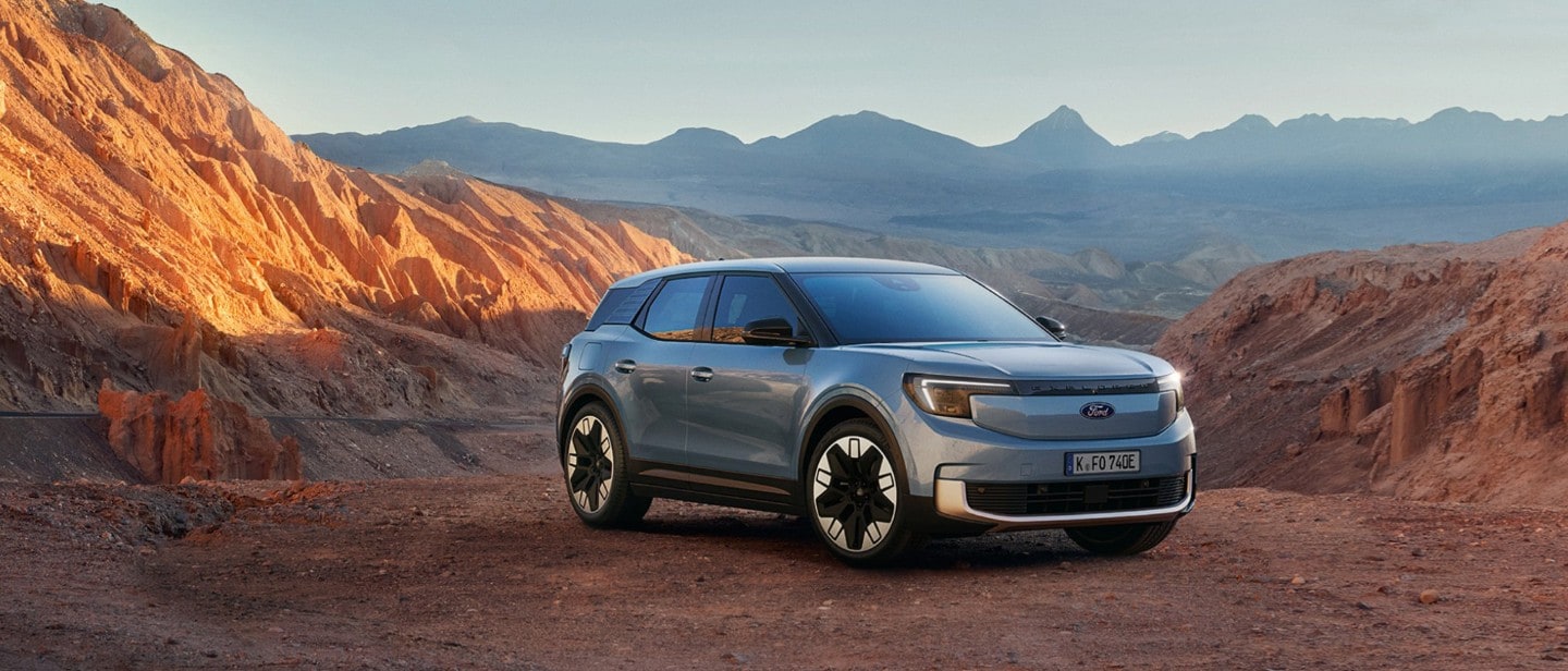 The New All-Electric Explorer being driven through wild landscape